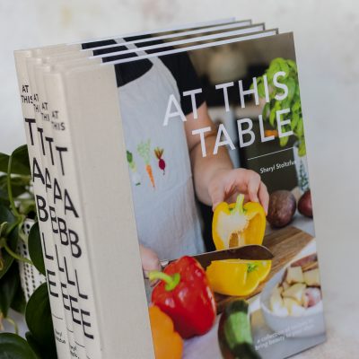At This Table